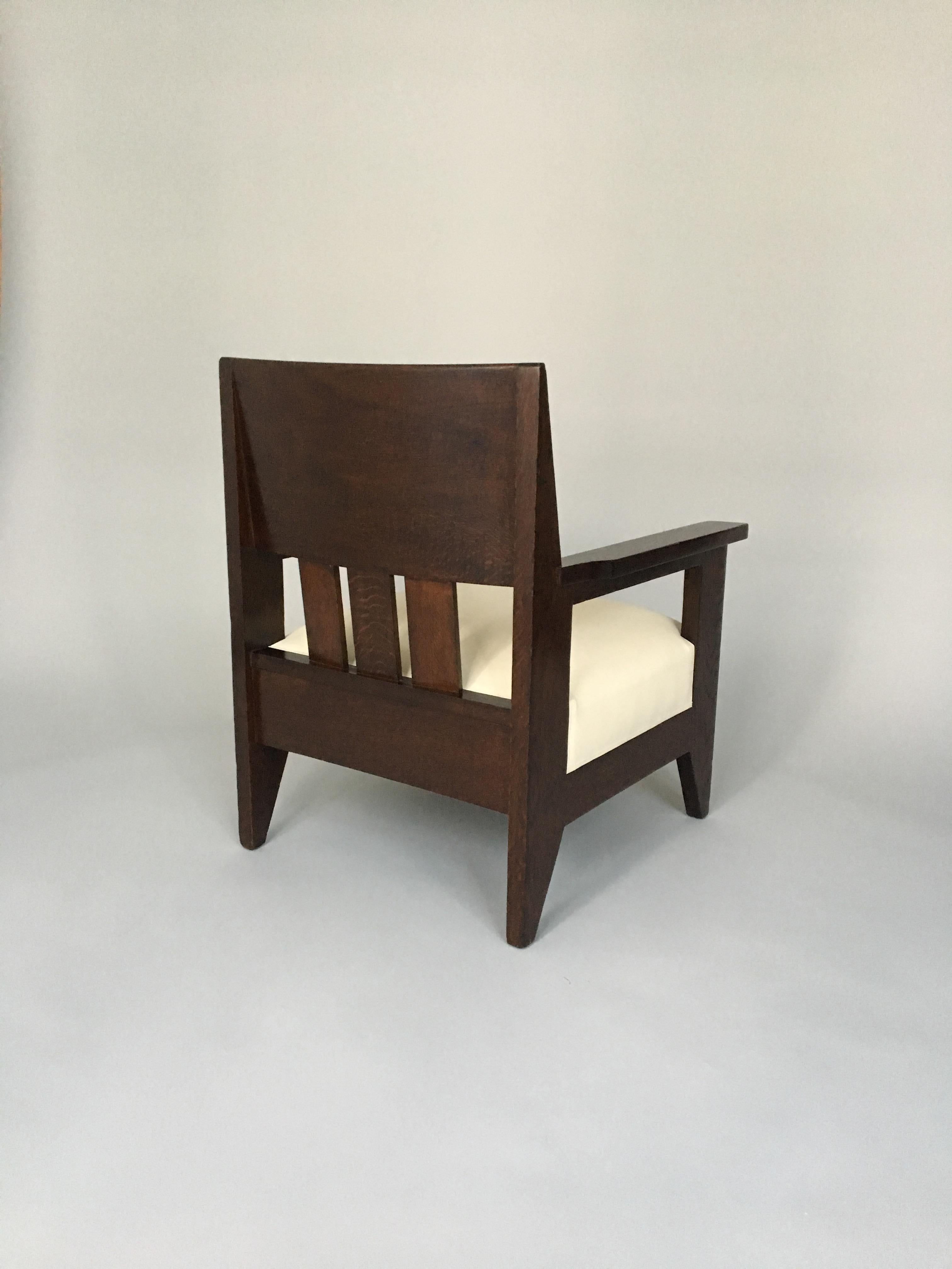 Here is a Hendrik Wouda armchair in oak from 1921.
Hendrik Wouda was one of the most well known architect/Designers from The Hague School in Holland. The armchair has the Pander & Son stamp underneath. The armchair is documented in several books