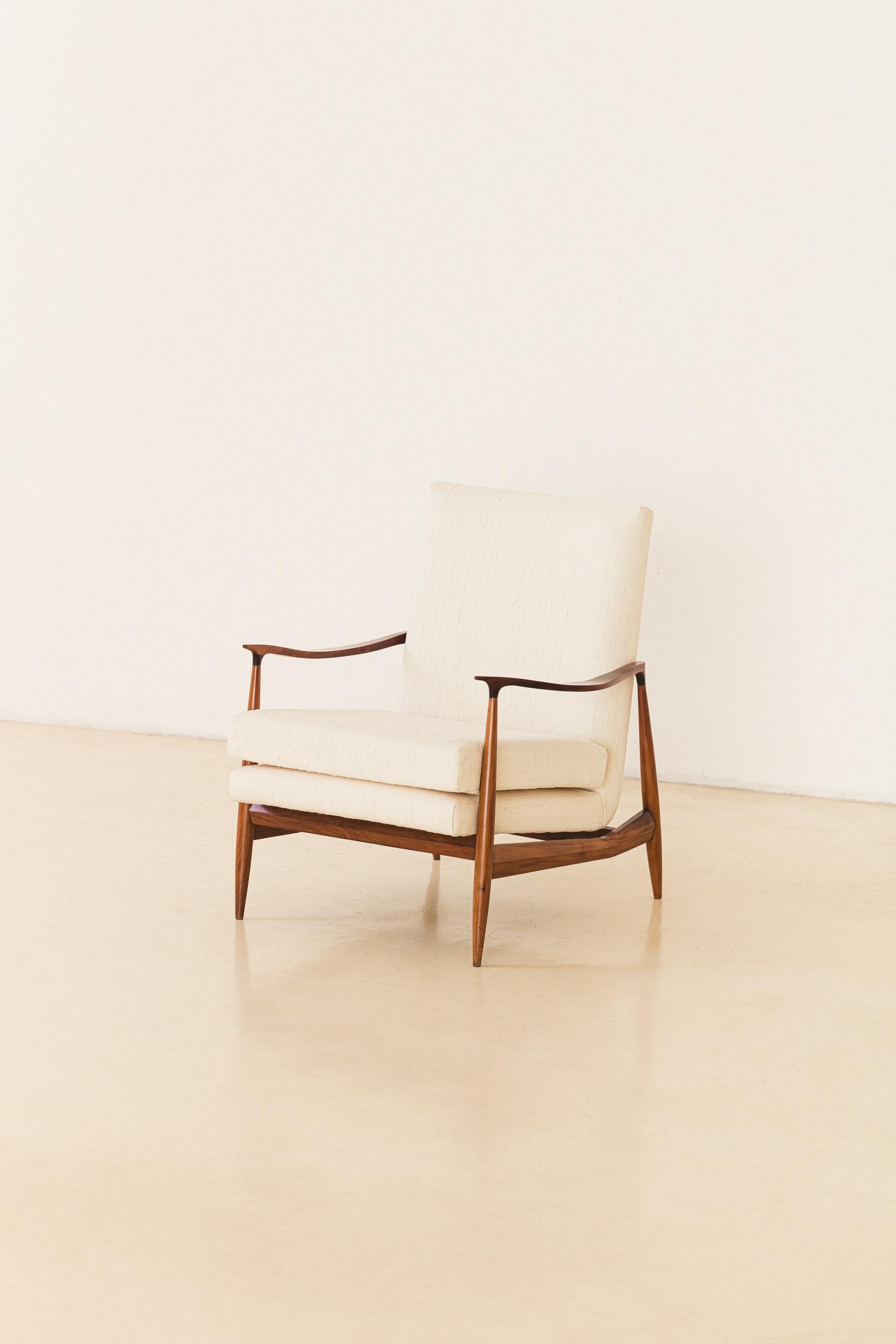 This Armchair was produced in the 1960s by the Brazilian company Móveis Cimo, a pioneer in Brazilian furniture industrialization.

Cimo's history starts in 1921 with a wood boxes factory, and ended in 1982 as the furniture factory Móveis Cimo S.A. –