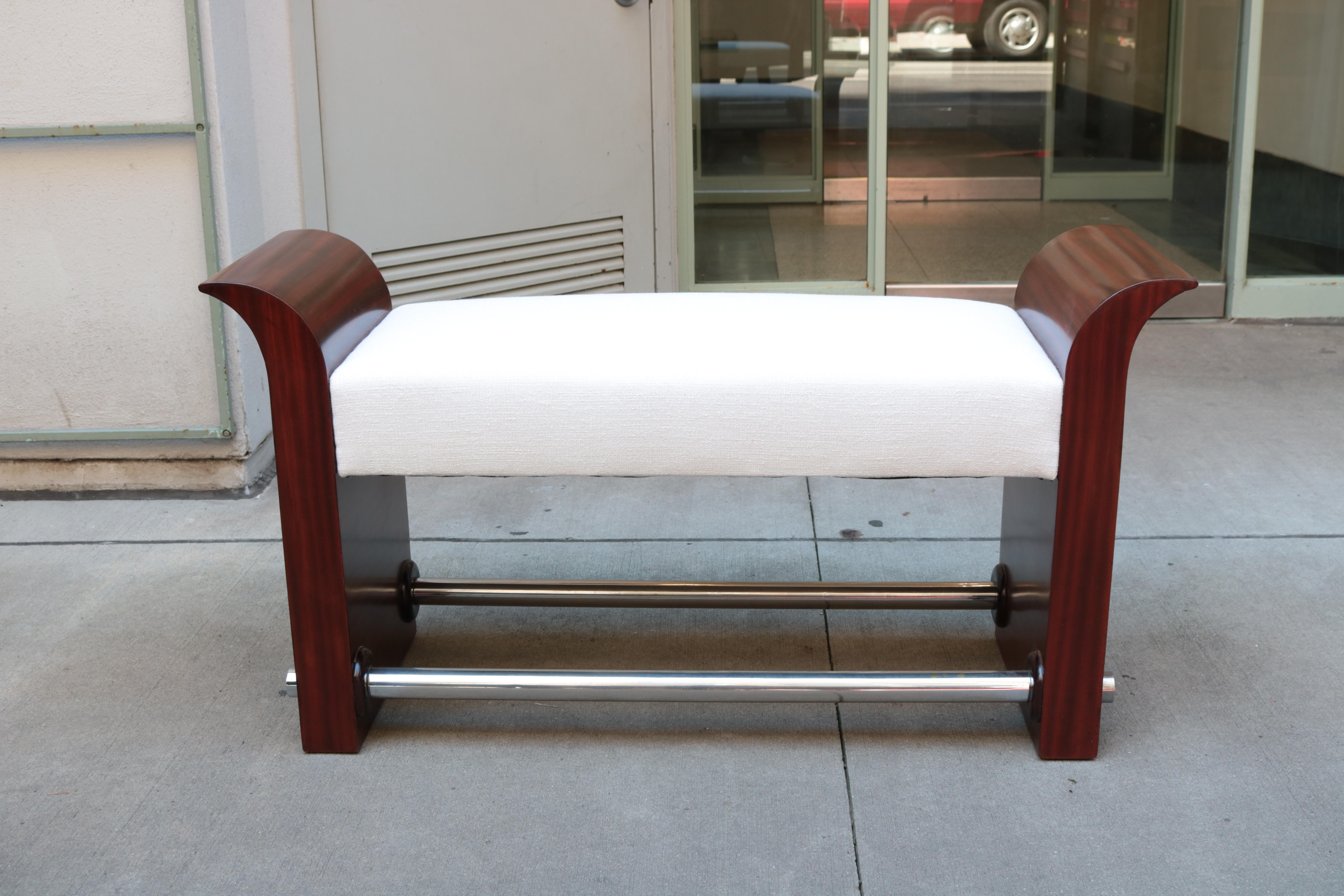 A single Art Deco bench with chrome stretchers and upholstered seat. 
This unique accent piece will complete the look of any room with style. 