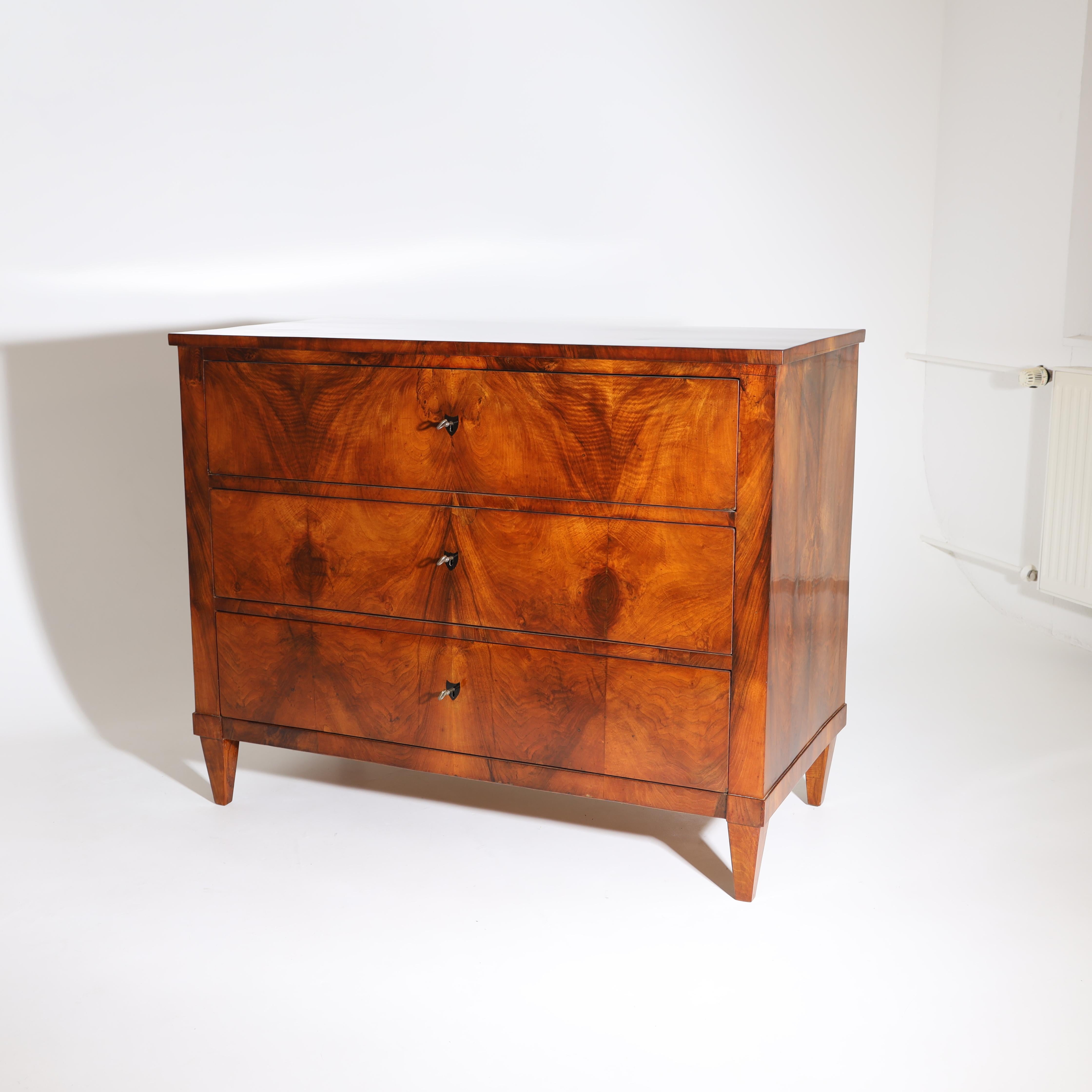 A single Biedermeier chest of drawers. Walnut.