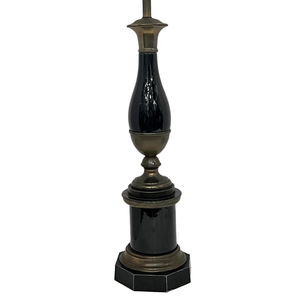 A single circa 1920's French porcelain and bronze column shaped Empire style table lamp.

Measurements:
Height of body: 24