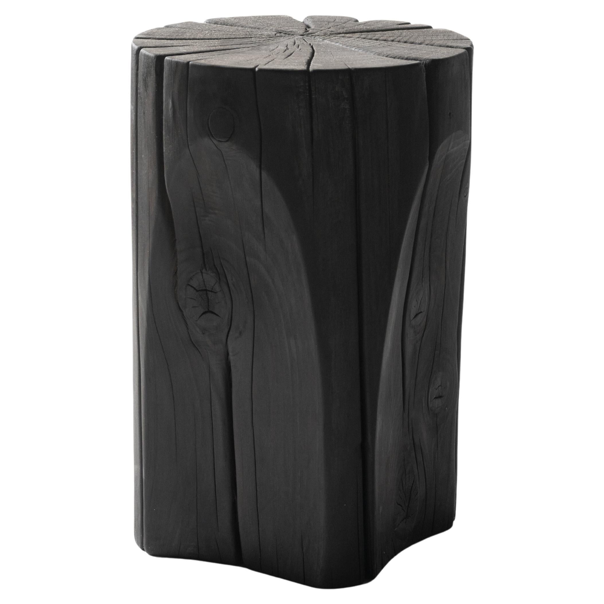Sgabello Single Block Wood Faces di Sebastián Cappiello