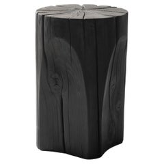 Sgabello Single Block Wood Faces di Sebastián Cappiello