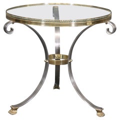 Tavolino singolo in ottone e acciaio con piano in vetro stile Maison Jansen