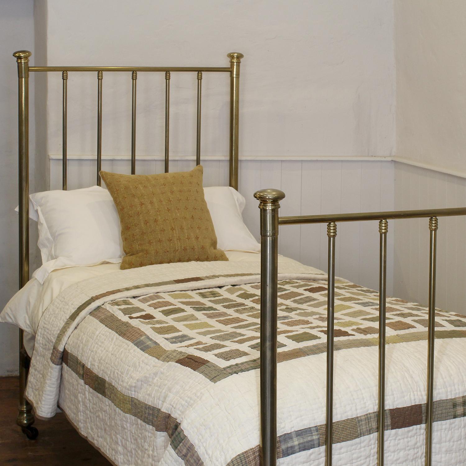 single brass bed