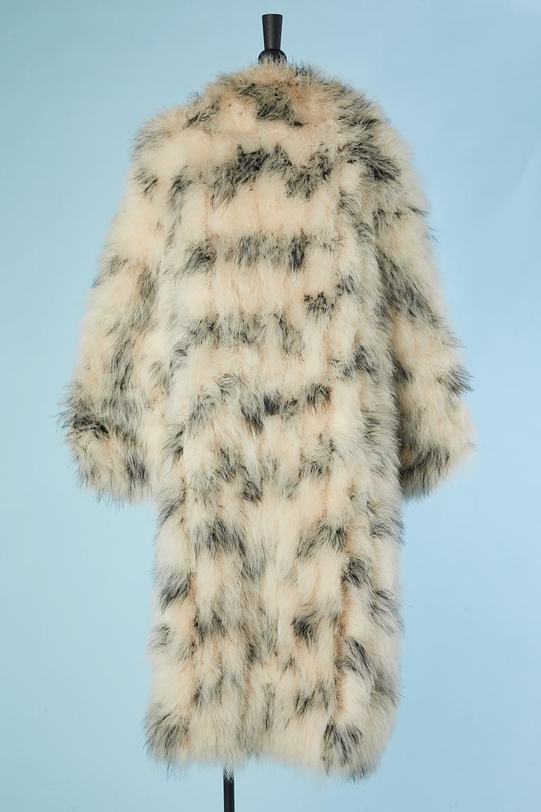 Single breasted black spotted ivory feather coat Circa 1980's  1