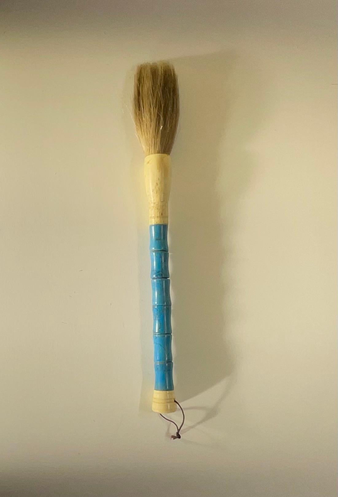 Beautiful single hand made calligraphy brush with exception turquoise marble beads ,bone , ferrule and horse hair. 
 Slight variation in each bead due to characteristics of genuine stone and bone.


