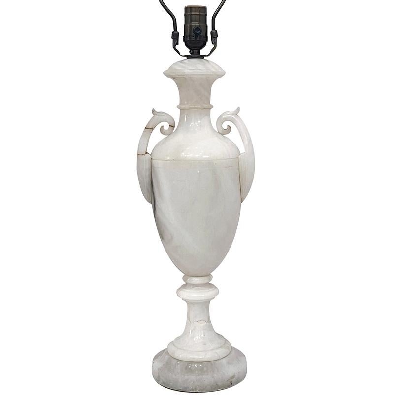 A circa 1920's Italian carved alabaster lamp.

Measurements:
Height of Body: 18.5