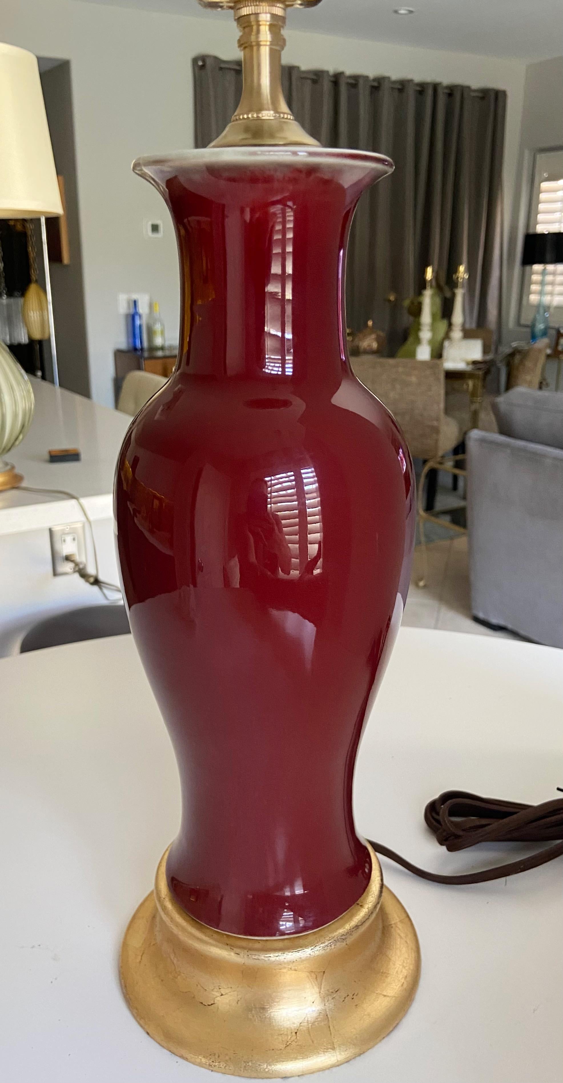 Mid-20th Century Single Chinese Sang De Boeuf Oxblood Glazed Porcelain Table Lamp For Sale