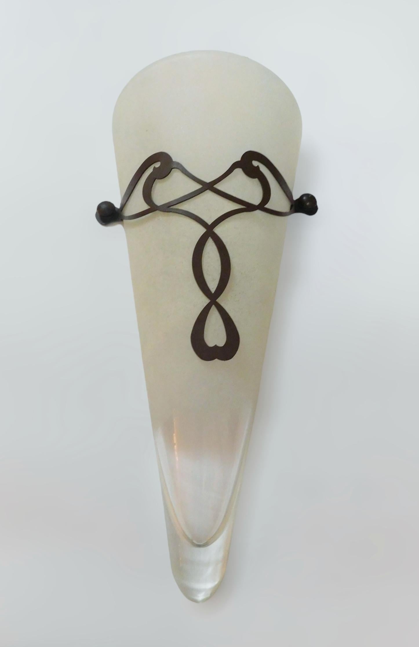 Italian wall light with frosted amber cone shaped Murano glass diffuser and bronze embroidery / Made in Italy, circa 1960s
Measures: height 21 inches / width 10 inches / depth 5 inches
1 light / E26 or E27 type / max 60W
1 available in stock in