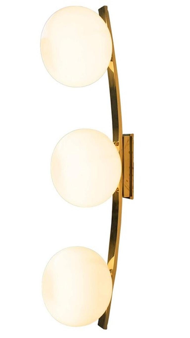 Italian wall light or flush mount with hand blown cream Murano glass pebbles, mounted on curved polished brass frame / Designed by Fabio Bergomi for Fabio Ltd / Made in Italy
3 lights / E12 or E14 type / max 40W each
Measures: Height 31.5 inches /