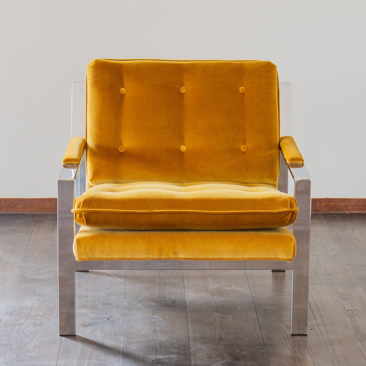 A single nickel plated lounge chair, model number 232 designed by Cy Mann, circa 1970s. The chair has been upholstered in a yellow velvet with buttoned detail to the seat and back and upholstered arm pads. Cy Mann designed chairs for Cy Mann Designs