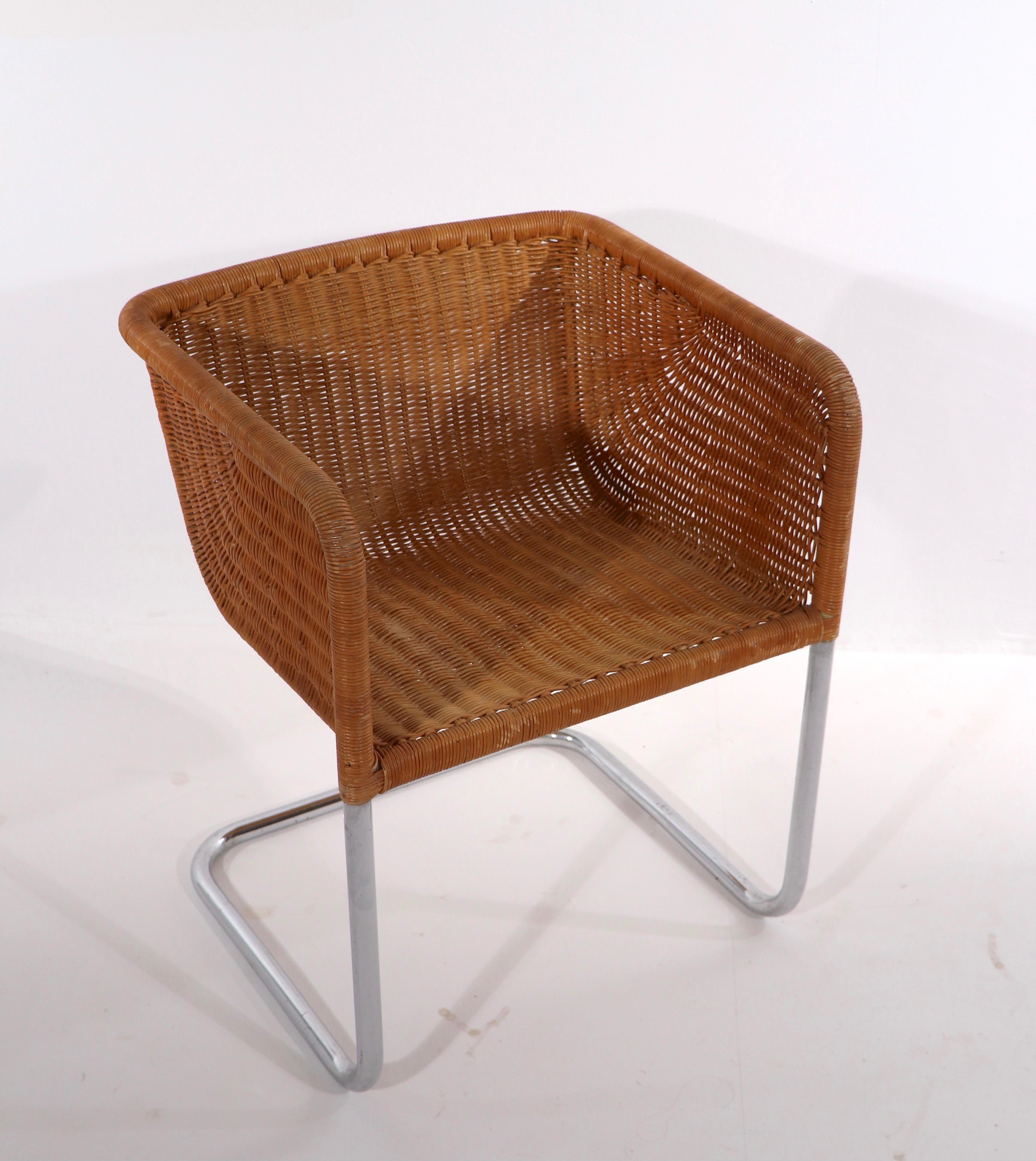 Iconic wicker and chrome D43 cantilevered chair by Fabricus and Kastholm for Harvey Probber, circa 1960's. This example is in very fine, original condition, showing only inconsequential cosmetic wear, normal and consistent with age. Perfect for use