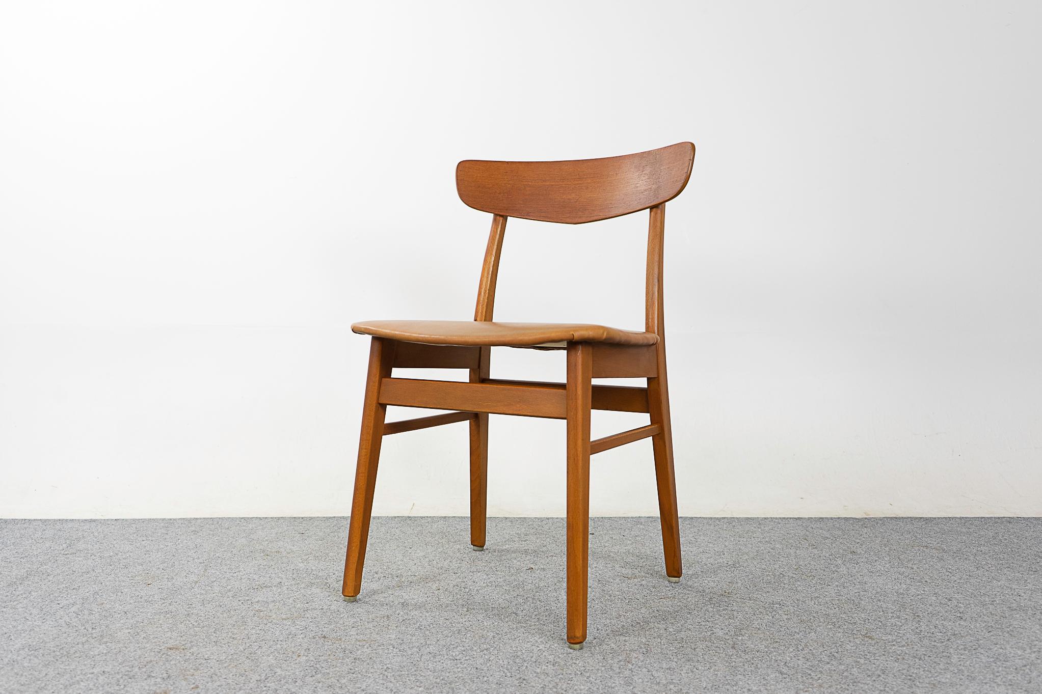 Teak & beech mid-century dining chair, circa 1960's. Beautifully curved backrests and generous seat design provide support and comfort. Solid wood frame with cross braces for stability and support. Removable seat pad makes reupholstering very easy.