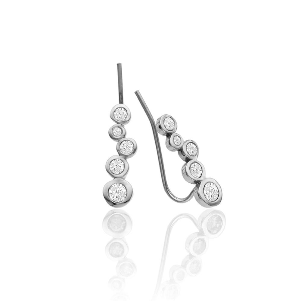 Wear this SINGLE long linear climber earring with trickling down white diamonds to make it look as if you're wearing multiple earrings!

Inspired by seeing the cross-section view of life, as if slicing a tree to see its underlying structure and raw