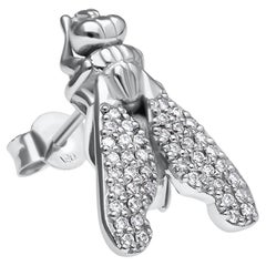 Boucles d'oreilles contemporaines en or blanc avec diamants simples