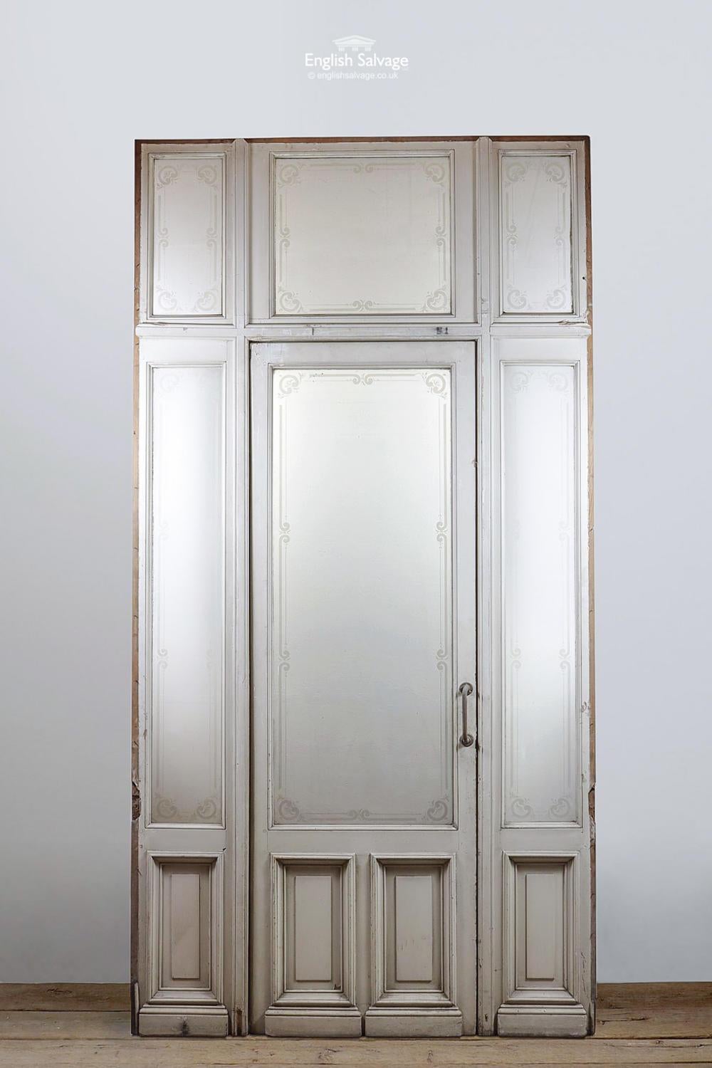 Reclaimed single door with a large etched frosted glass panel above two small raised and moulded panels. The door has a matching large glazed frame with fanlights. The overall size is below, the door itself is 85.3cm wide x 262.5cm high and is able