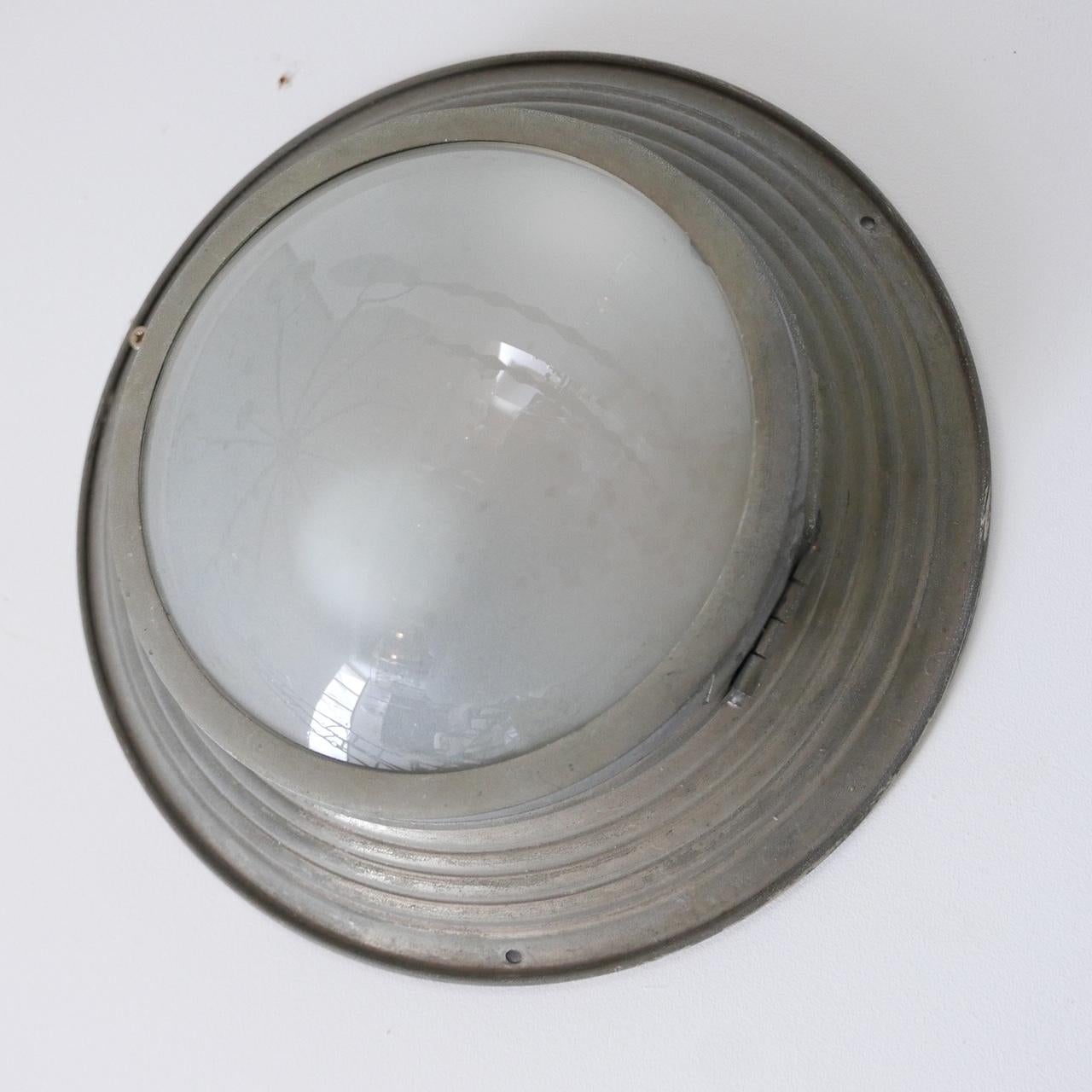 A metal and glass wall or ceiling light. 

Belgium, c1930s. 

Patinated nickel and etched glass. 

Since re-wired and PAT tested. 

Location: London Gallery. 

Dimensions: 30 diameter x 10 depth in cm. 

Delivery: POA

We can ship