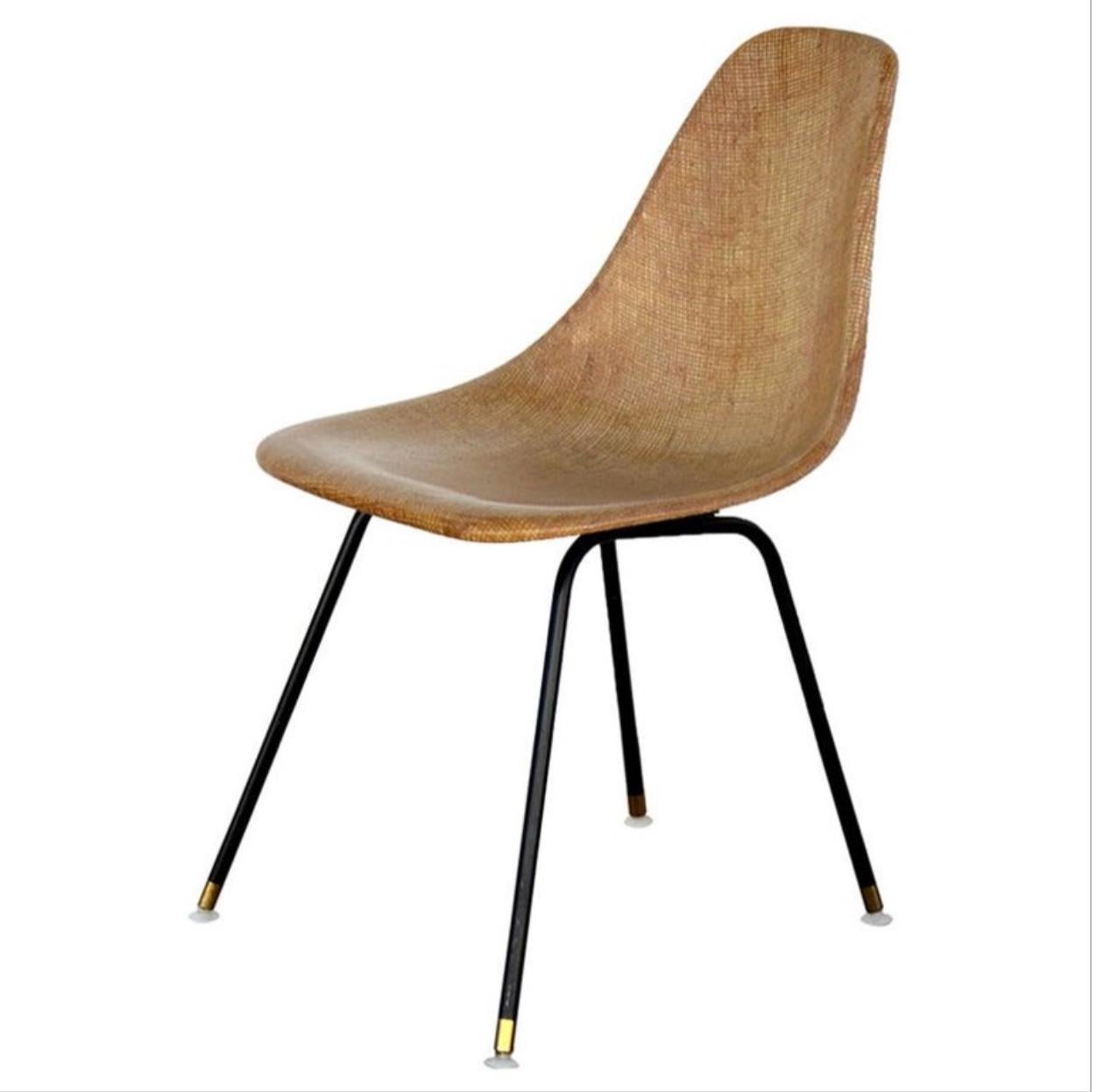 Single fiberglass encasted fabric mesh chair. Great for a desk or a side chair.
