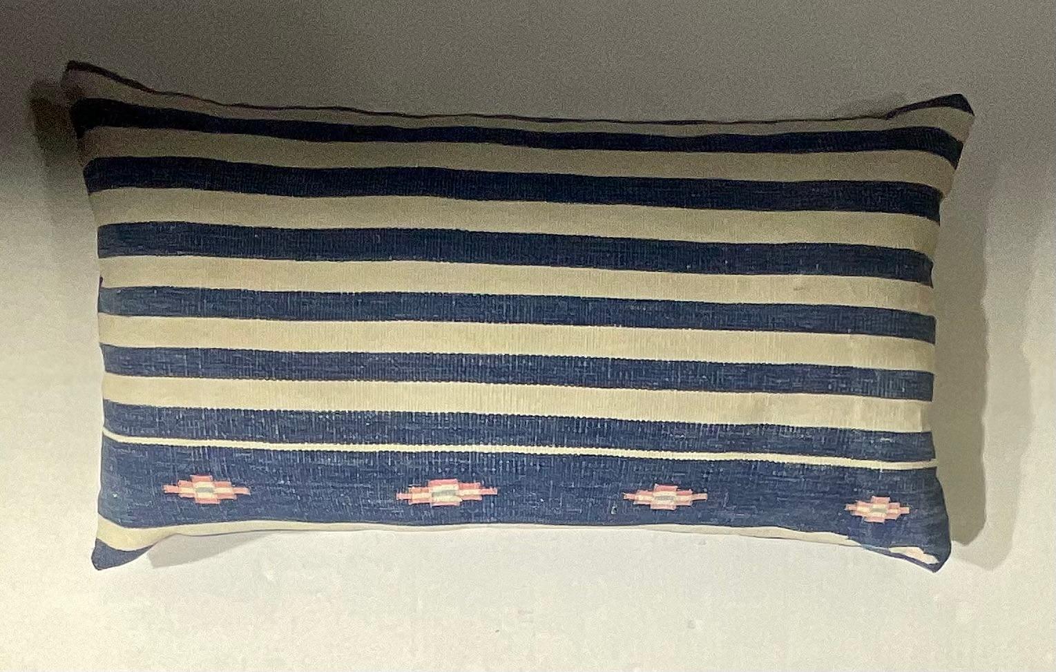 Beautiful pillow made of handwoven flat-weave antique Indian Durie textile on both side ,with indigo pink and cream  colors of geometric motifs 
fresh new insert.
The textile was professionally clean before become a pillow.