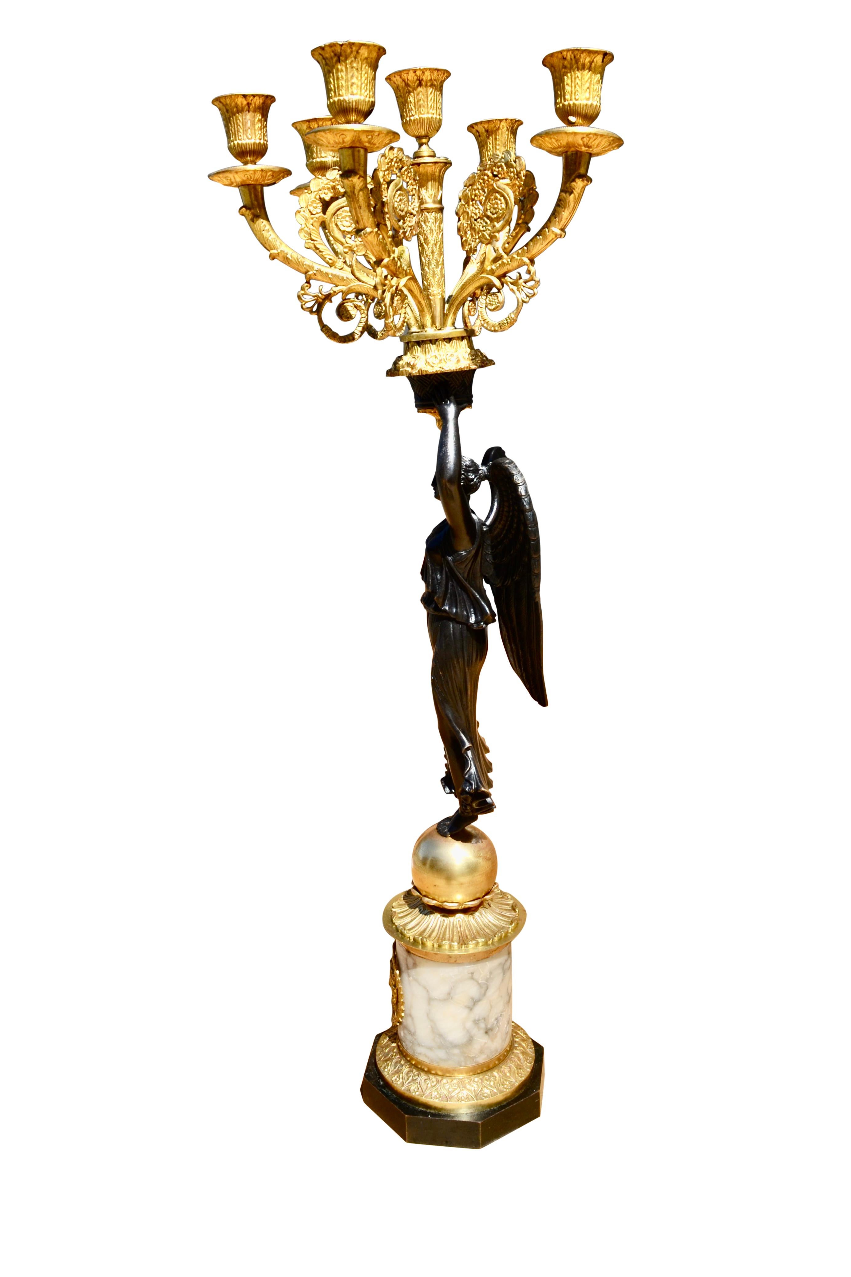 Single French Empire Style Patinated  and Gilt Bronze Winged Victory Candelabra In Good Condition For Sale In Vancouver, British Columbia