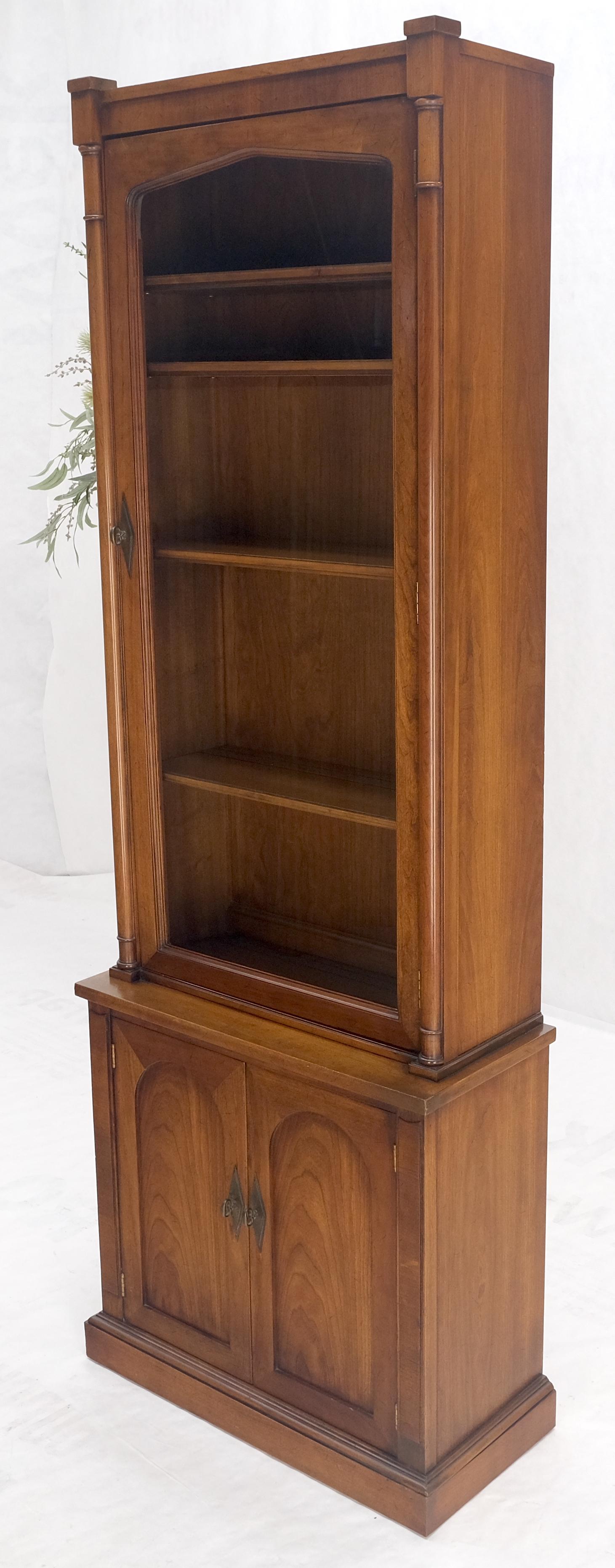 bookcase with cupboard at bottom