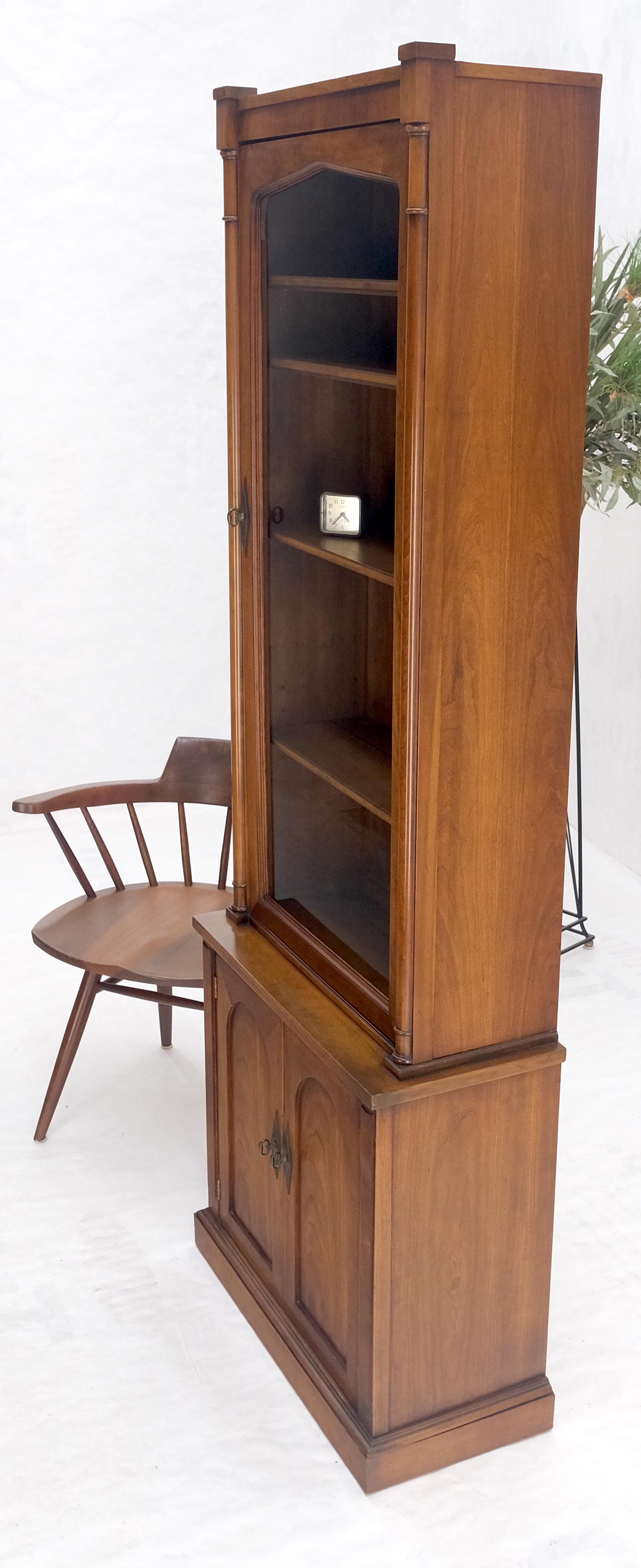 tall bookcases with glass doors