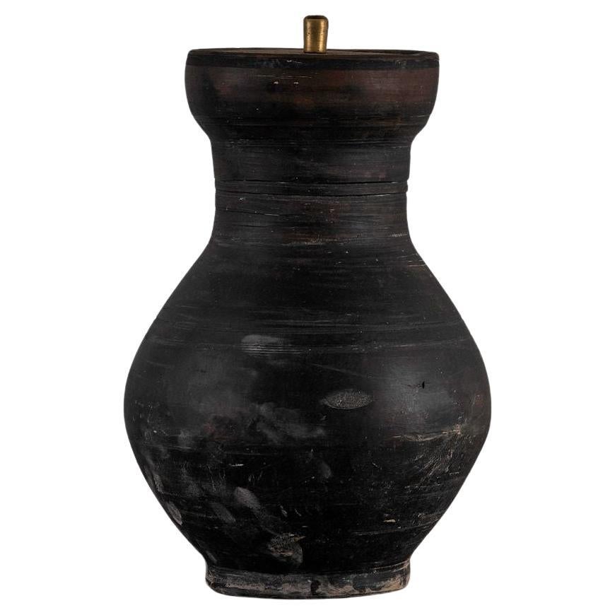 A beautiful unglazed Han dynasty style vase of a very elegant form.
Expectedly mounted as lamp - US WIRED. High quality mount with a brass adjustable pivot joint. 
The vase is from Zhejiang, china, mount and shade are made in Antwerp.
The Lamp is