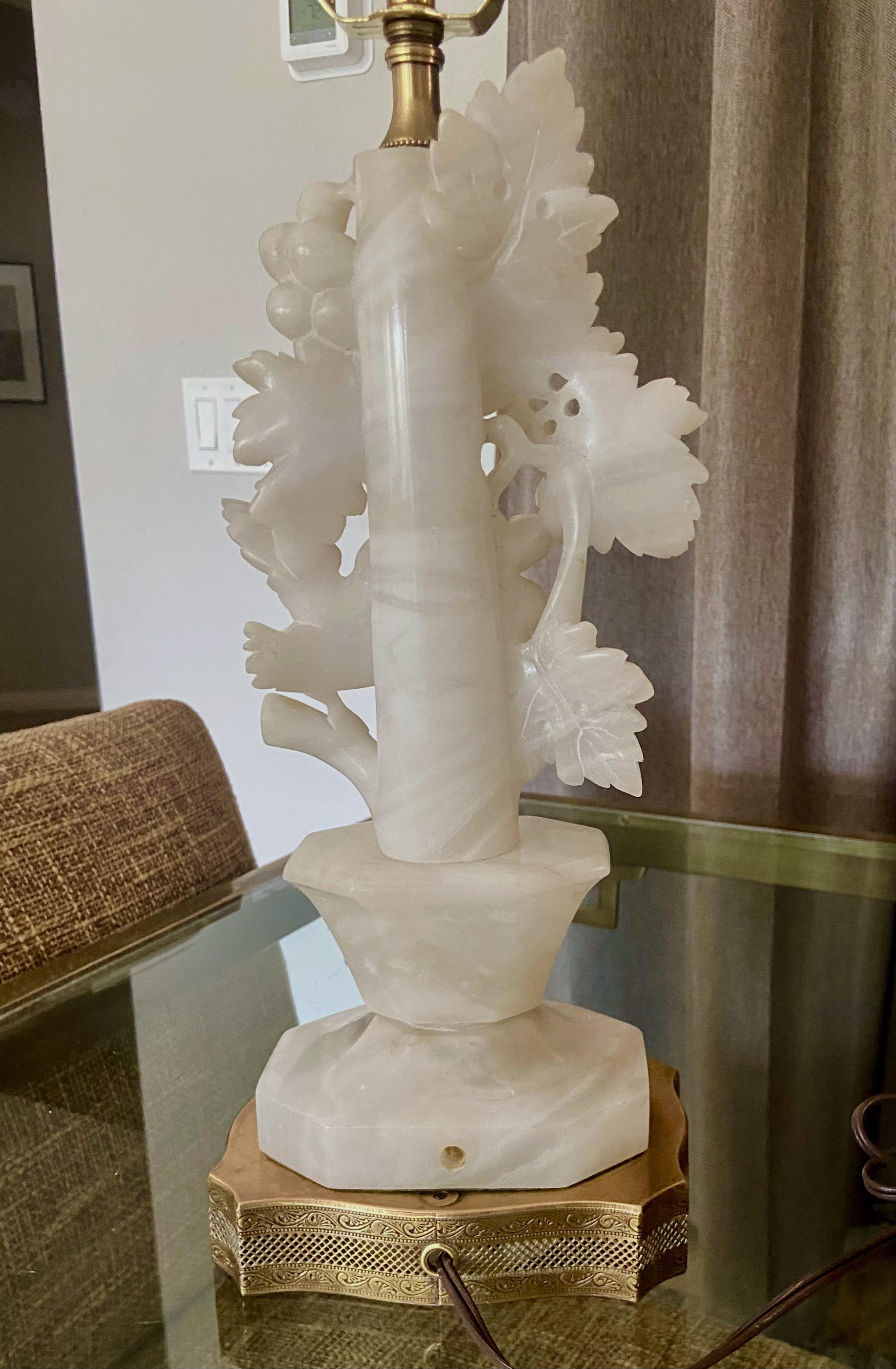 Single finely crafted hand carved bird and tree form alabaster lamp on filagree brass base. Newly wired with 3 way socket and cord.
 