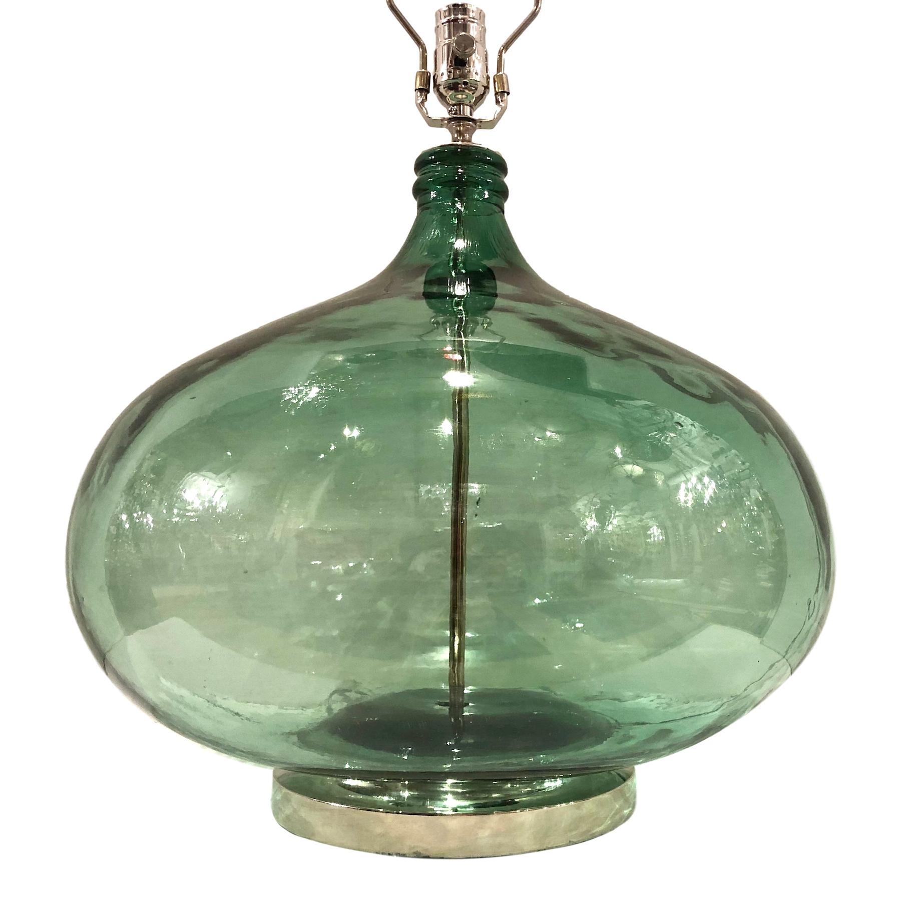 A single circa 1940's Italian extra large bottle converted to lamp.

Measurements:
Height of body: 16