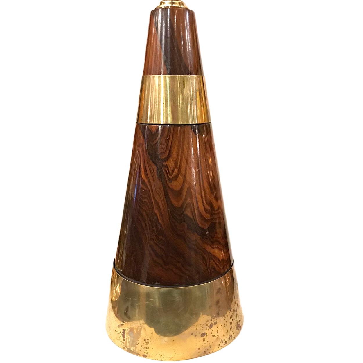 A single circa 1950's Italian wood and brass table lamp in a conical shape. 

Measurements:
Height of body: 15