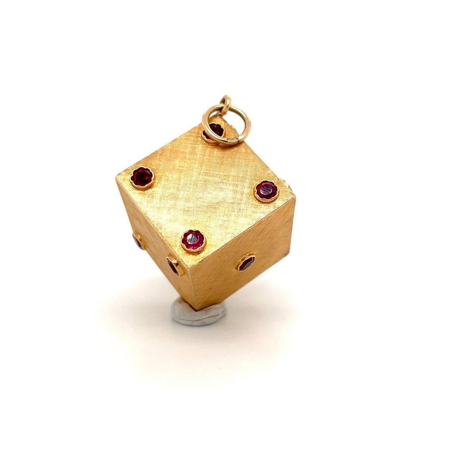 Retro Large 14k yellow gold dice charm featuring bezel set faceted garnets with hand textured background measuring 1 x 3/4 of an inch.