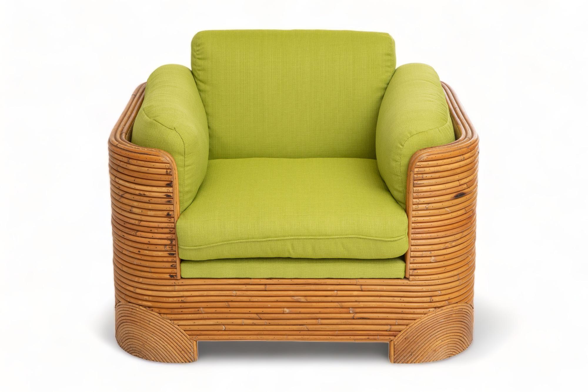 Single large split bamboo lounge chair, 
Circa 1970 USA
Generous proportion and curved lines
Newly upholstered in chartreuse fabric
Bamboo retains a warm original patina
