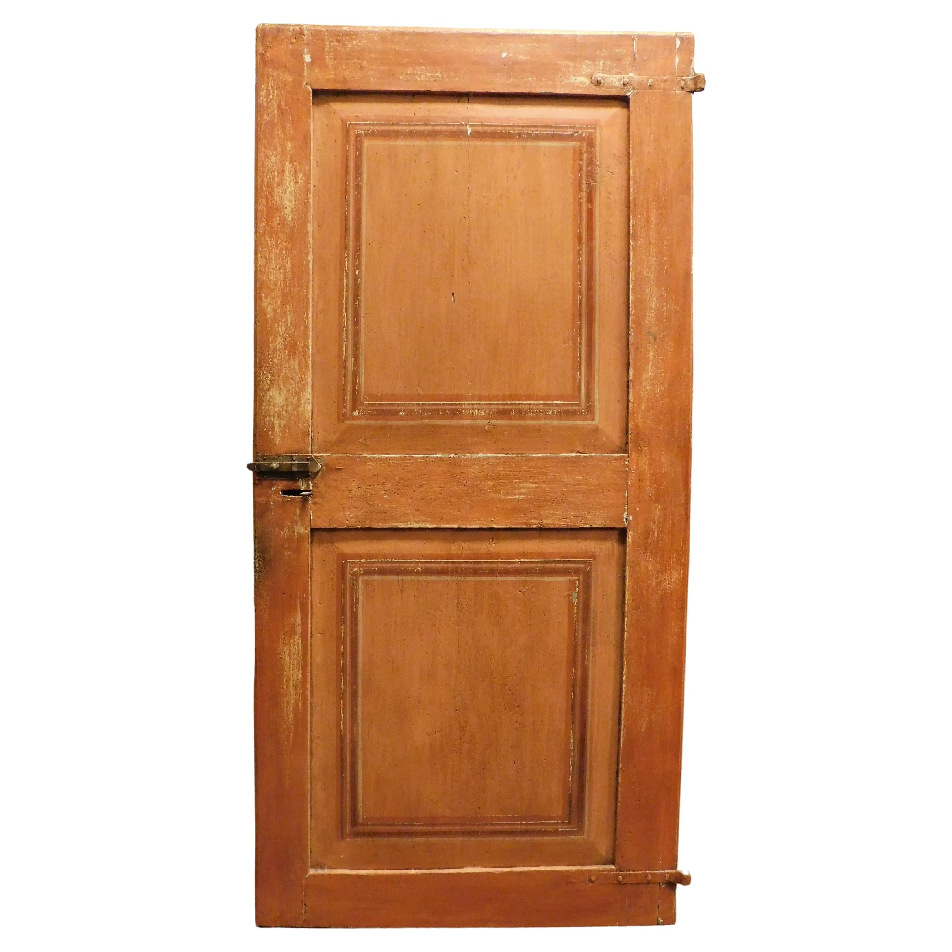 Single-leaf door in orange lacquered wood with painted squares, Italy