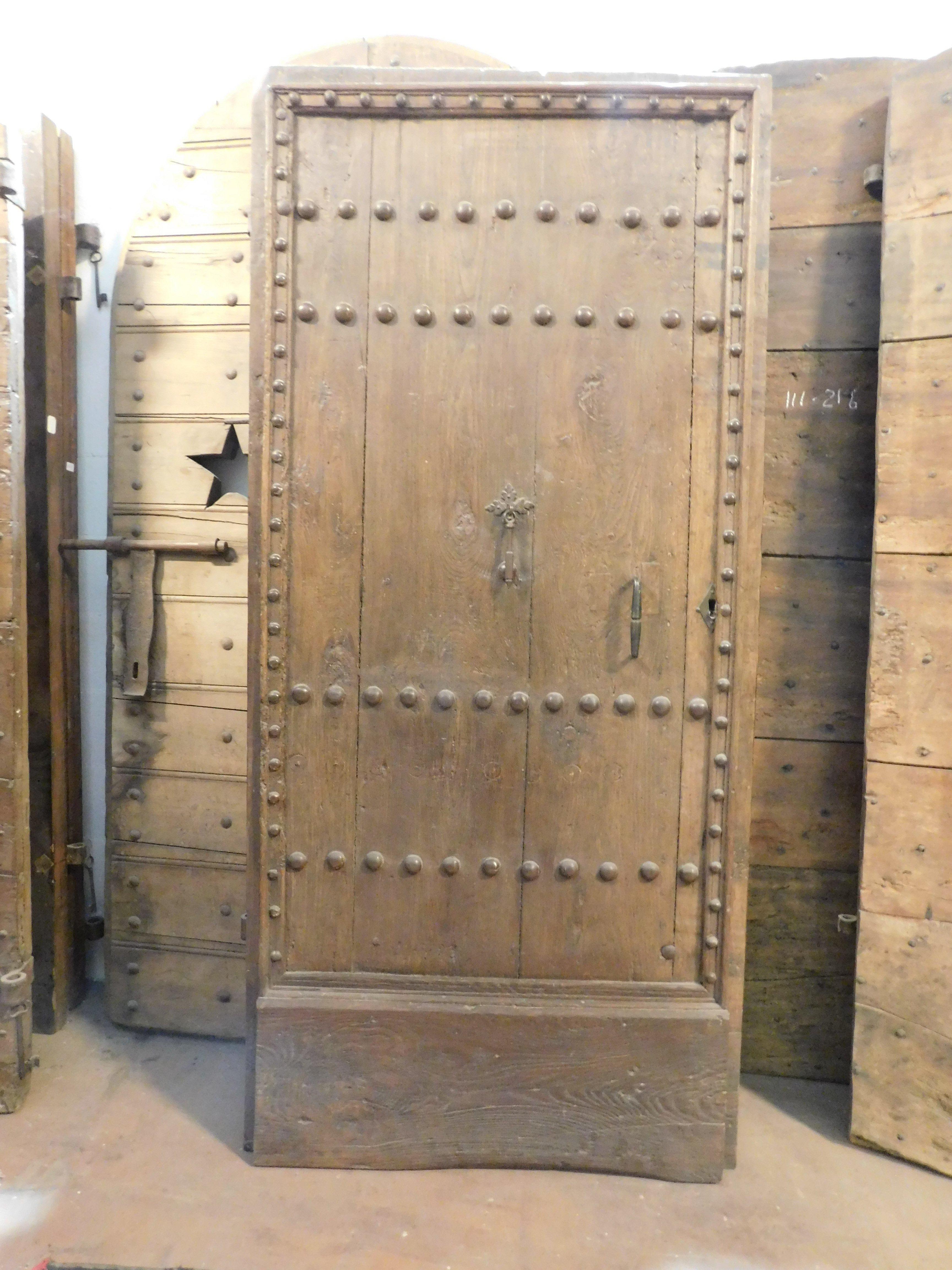 18th Century and Earlier Single-leaf nailed entrance main door, in chestnut wood, Italy For Sale