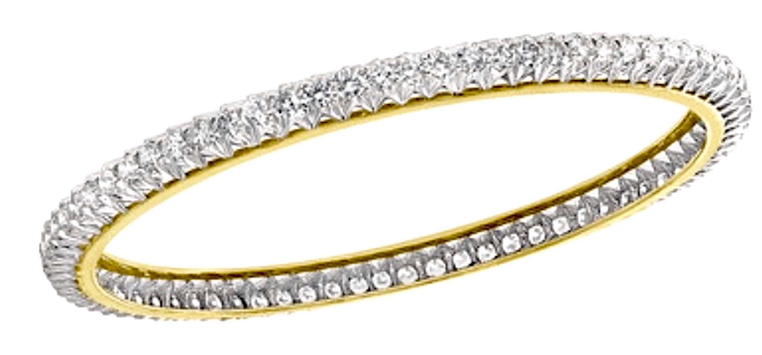 Single line 11.25  Ct Contemporary  18 K Yellow  Gold & Diamond Eternity  Bangle Pair
It features Two  bangles  crafted from  18k Yellow gold   embedded with  11.25 Carats of  Round brilliant diamonds in two bangles . 
These are slide on