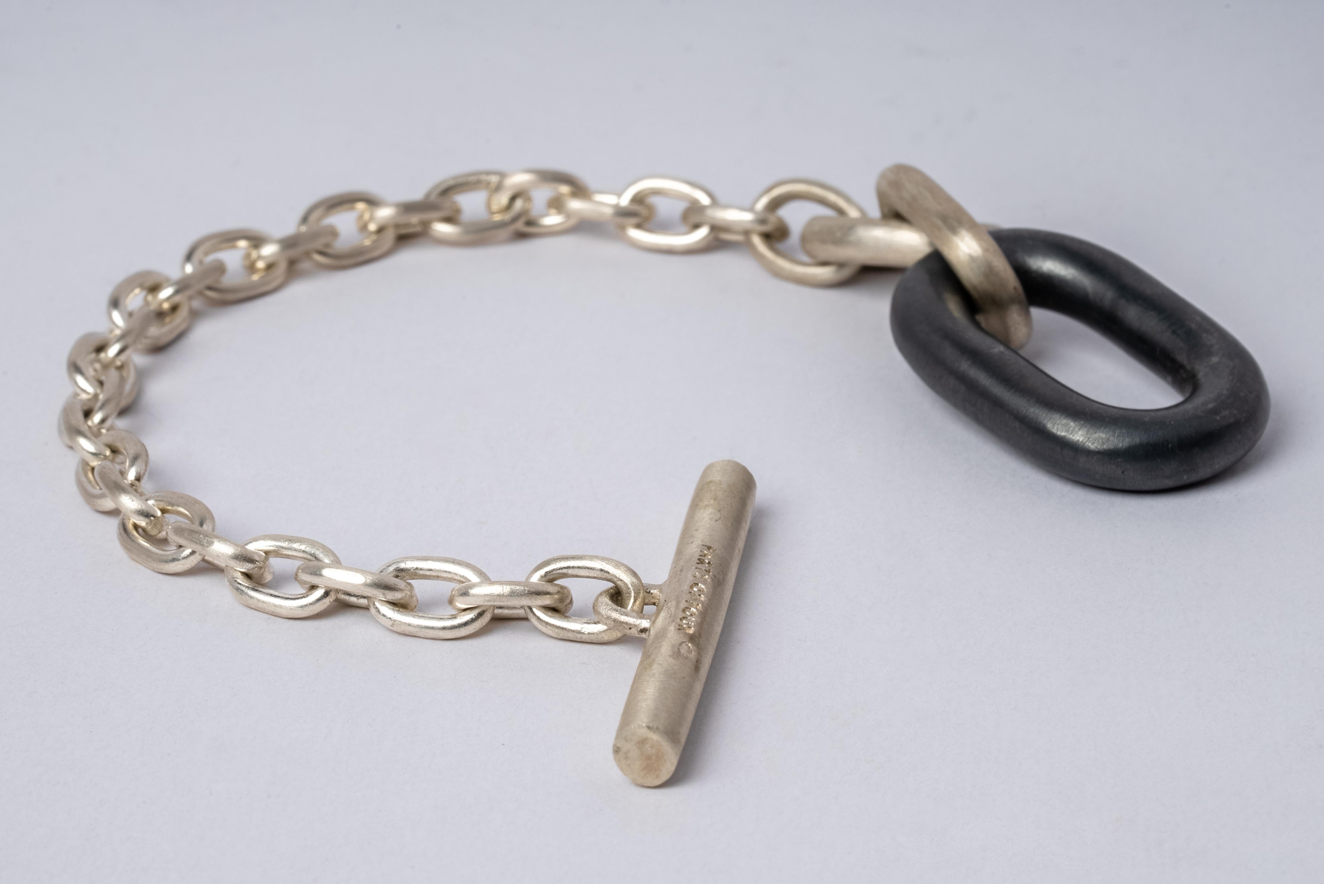 Bracelet in oxidized sterling silver toggle and matte sterling silver chain. Black sterling silver finish may fade over time, which can be cosidered an enhancement. Please note that Black Sterling tends to appear darker in photograph than in