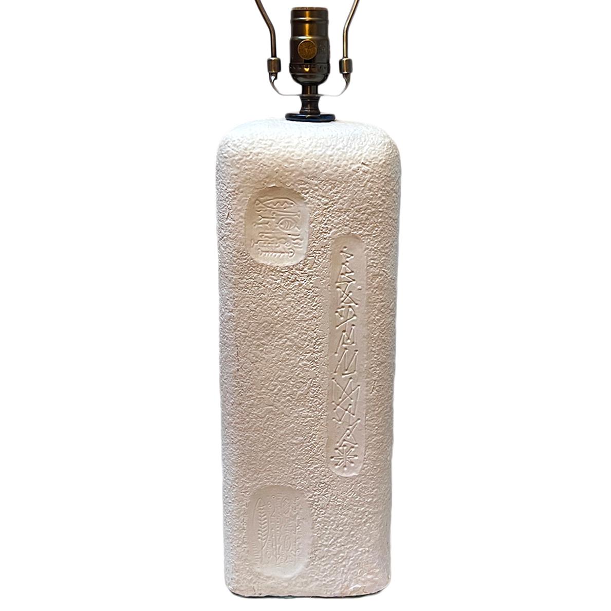 A circa 1960's Swedish plaster lamp with abstract decoration.

Measurements:
Height of body: 17
