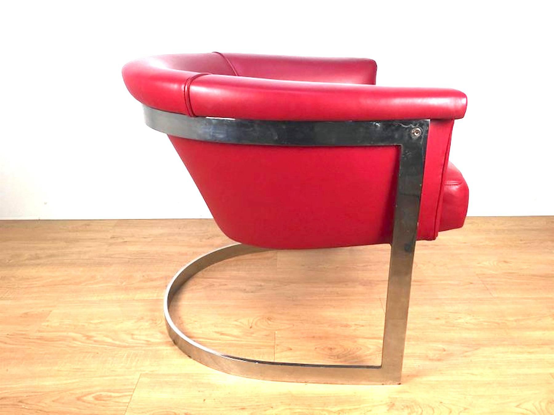1970s Barrel Back Lounge Chair in Custom Red Leather, Chrome barrel back armchair in the style of Milo Baughman. Clean, bright frame with rich deep red leather upholstery and accent pillow.