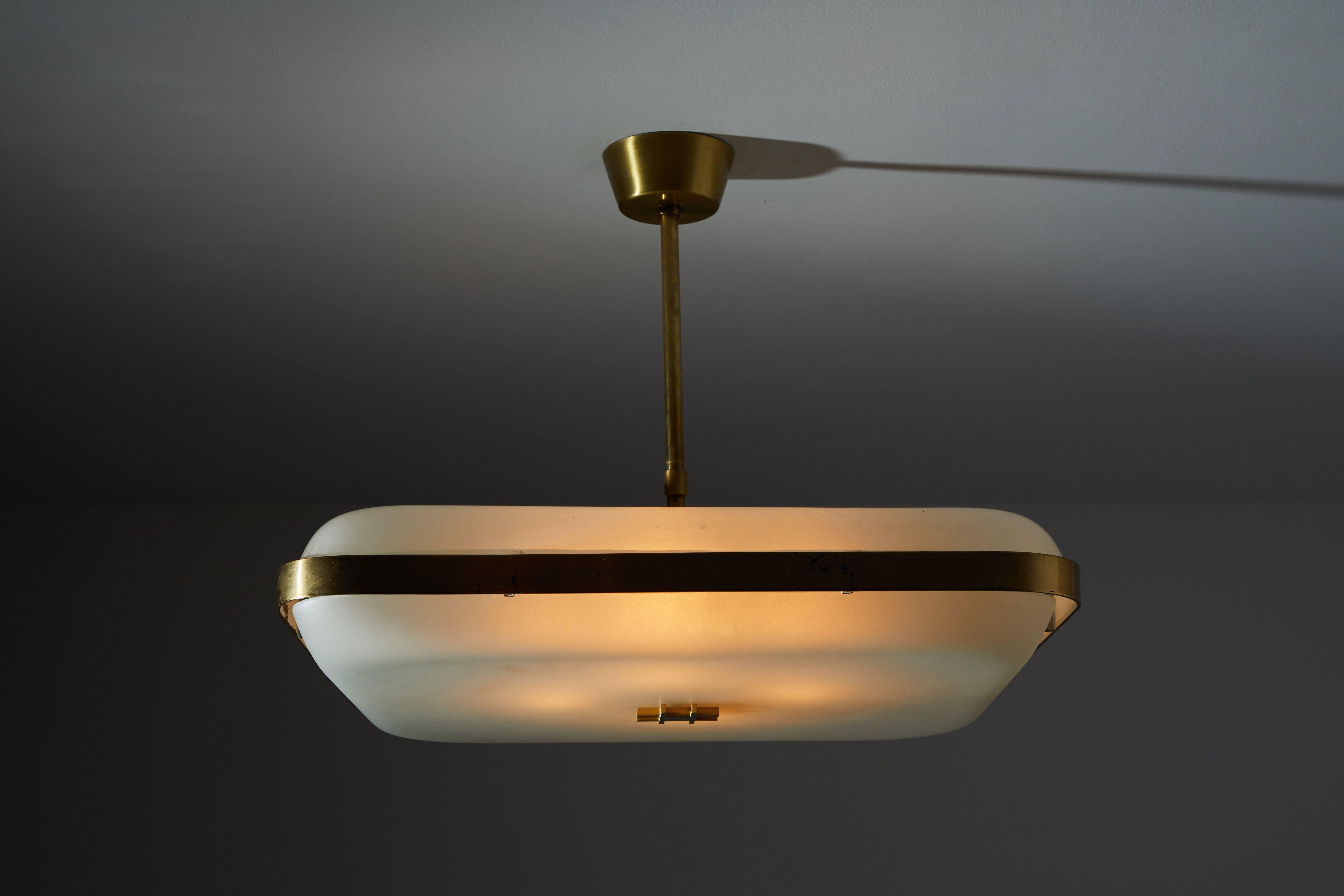 Single model 2022 flush mount ceiling light by Max Ingrand by Fontana Arte. Designed and manufactured in Italy, circa 1960s. Satin glass with brushed brass hardware. Rewired for US junction boxes. Light takes four E27 40w maximum bulbs. Literature: