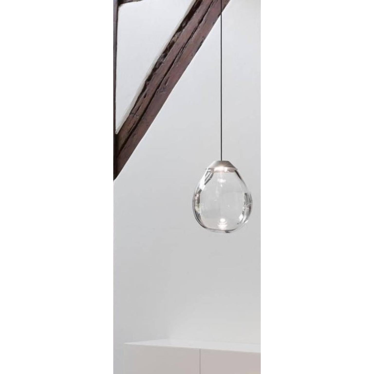 Single momentum blown glass pendants by Alex de Witte
Dimensions: 20 - 25 cm
Materials: Mouth Blown Glass.
Dimensions may vary.

With the Momentum Alex de Witte has found the prefect artistic defining moment while playing with the boundaries of