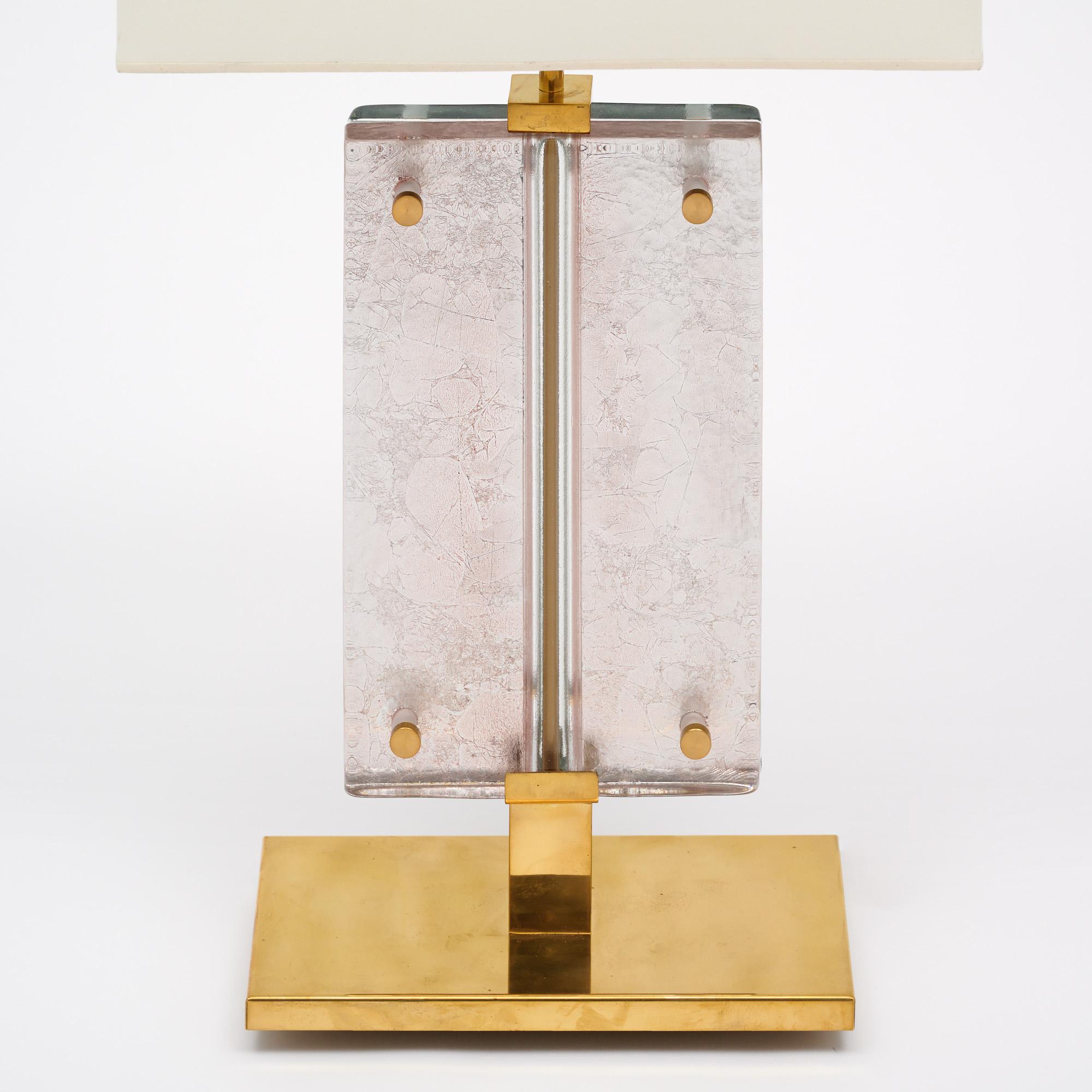 Single lamp from the island of Murano outside of Venice, Italy. Slabs of hand-blown glass are supported by a solid brass structure. One side showcases a blue Fontana Arte glass backed with silver leaf, while the other side showcases a rose-pink hue.