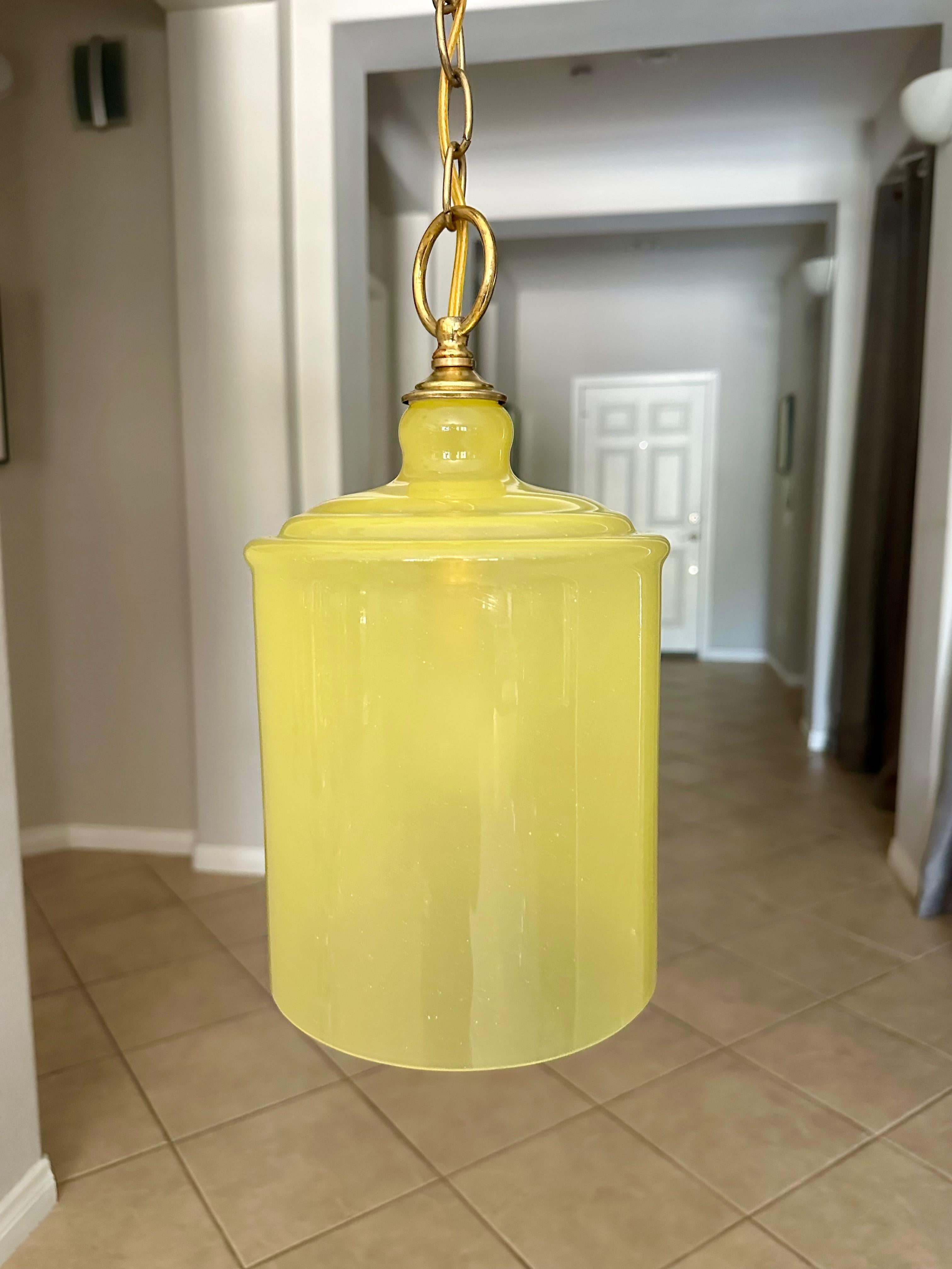 Single Seguso handblown Italian Murano matte yellow glass pendant hanging ceiling light/ Includes brass hardware and ceiling canopy. Newly wired for US, uses single standard A-base bulb. 

Height of glass portion 12