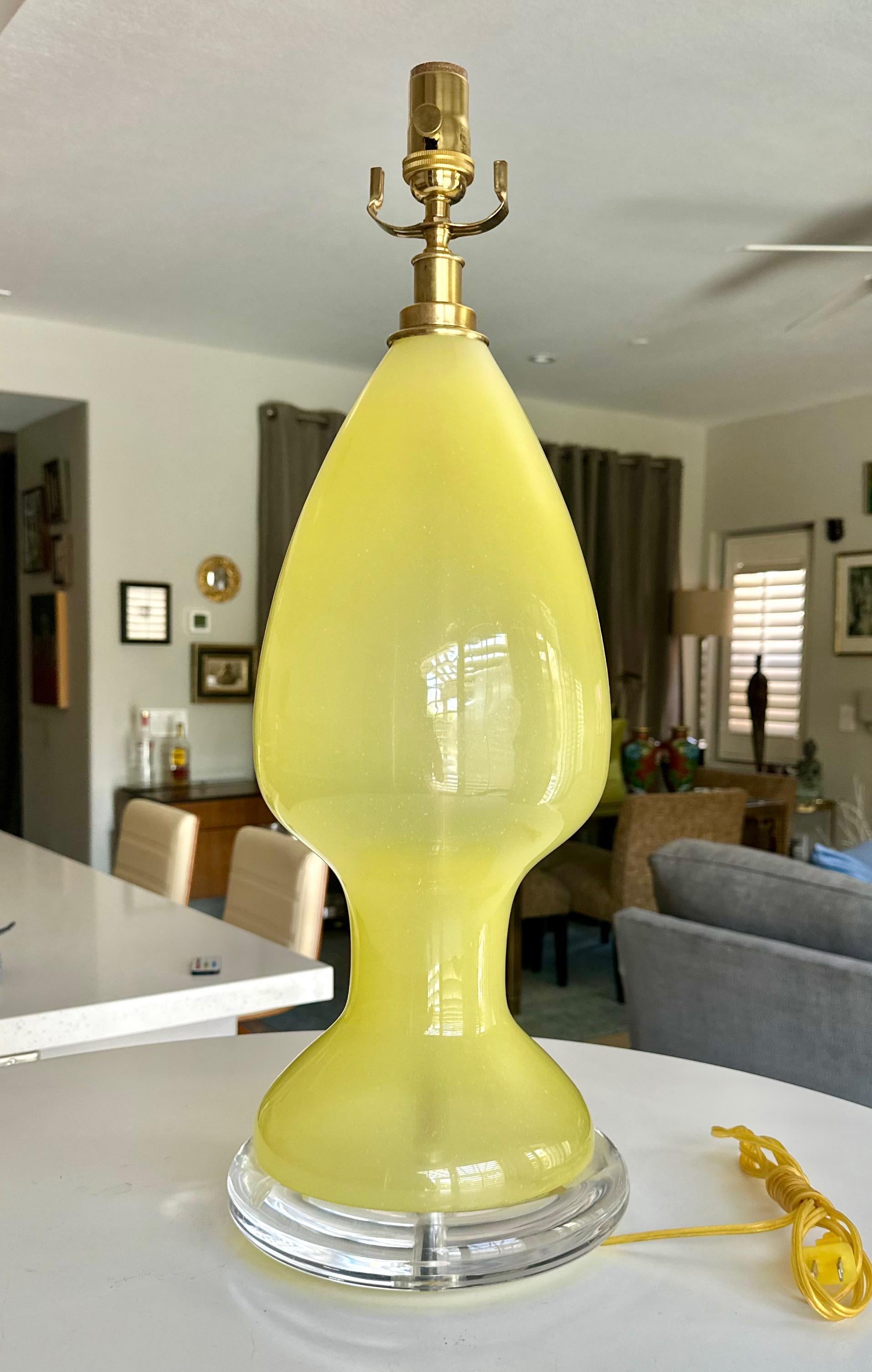 Single Seguso handblown Italian Murano matte yellow glass tables lamp on an acrylic base. Newly wired for US with 3-way socket and cord. 

Height of glass portion 18