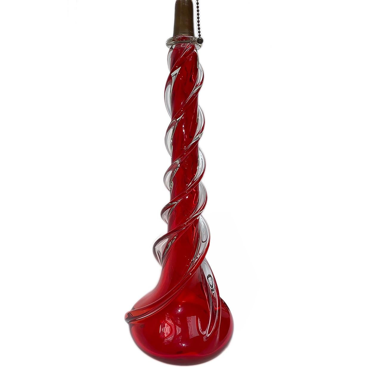 Murano deep red Murano glass encased in clear glass, circa 1930s

Measurements:
Height of body: 17.5