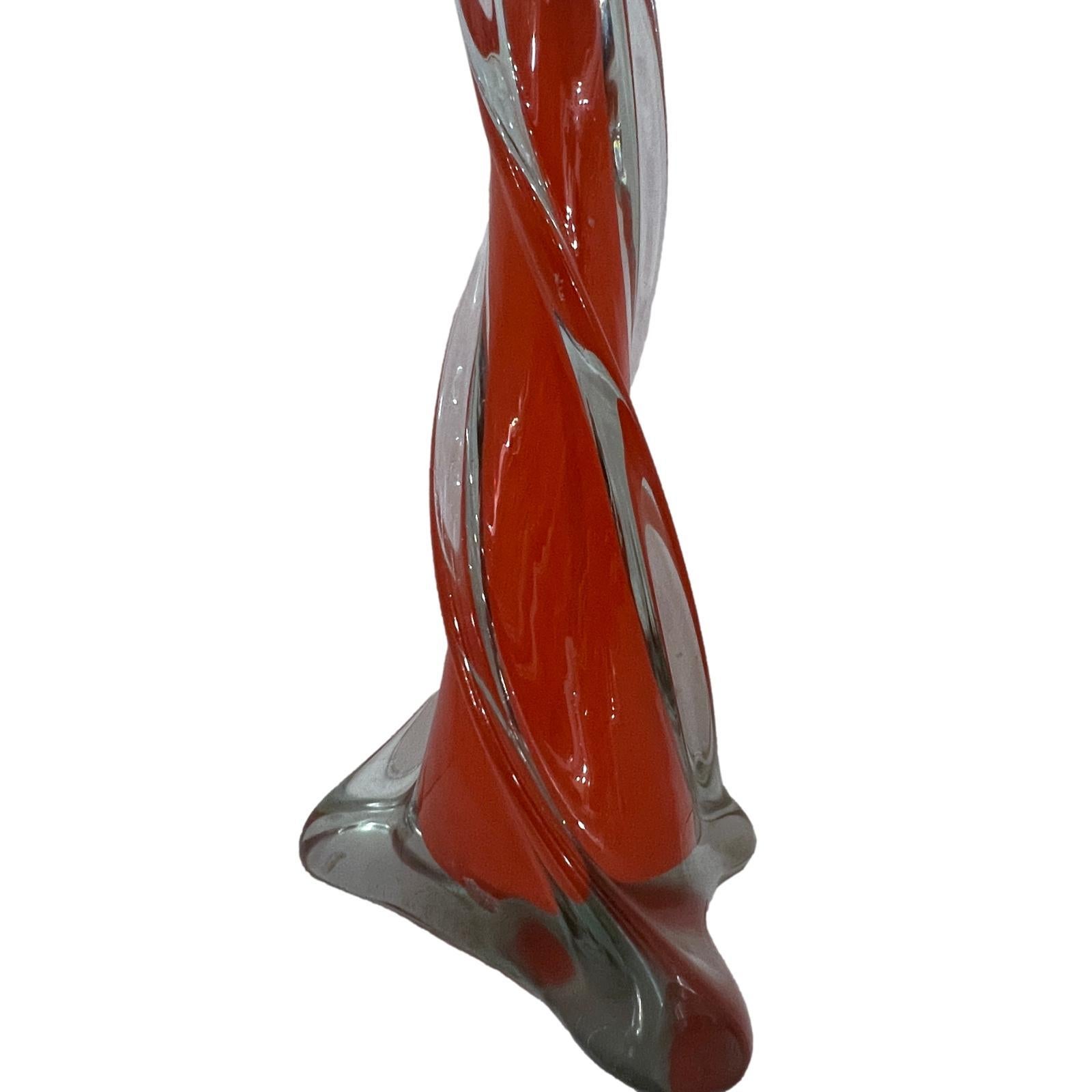 A single circa 1960’s Murano glass table lamp.

Measurements:
Height of body: 16.5″
Height to shade rest: 25.5″
Diameter: 7.5