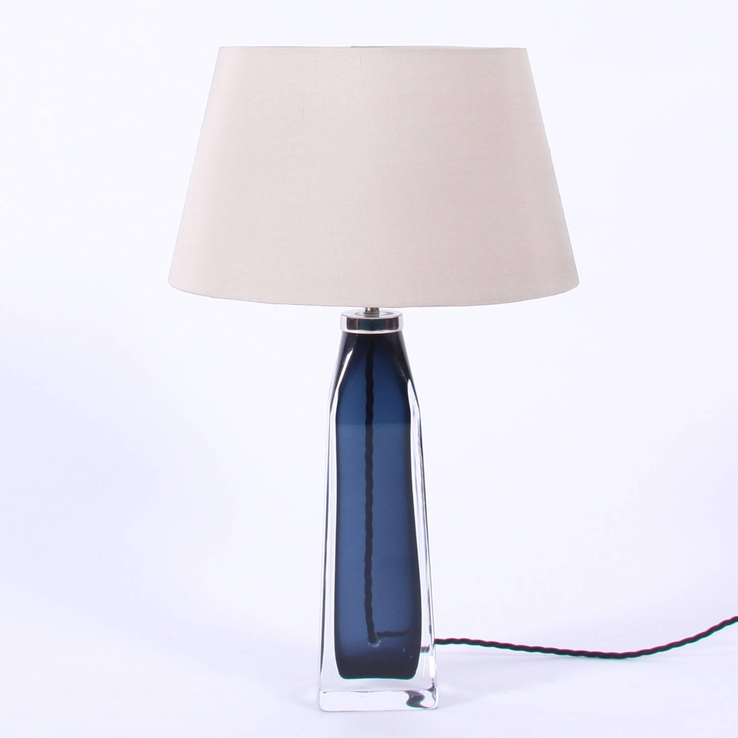 Swedish, circa 1960

A single, navy blue, Orrefors lamp with rectangular base. Stamped with the maker's name. 

Pictured with a bespoke, handmade, silk shade. 

Rewired and PAT tested.