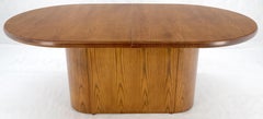 Single Pedestal Base Oval racetrack Shape Two Leaves Cerused Oak Dining Table