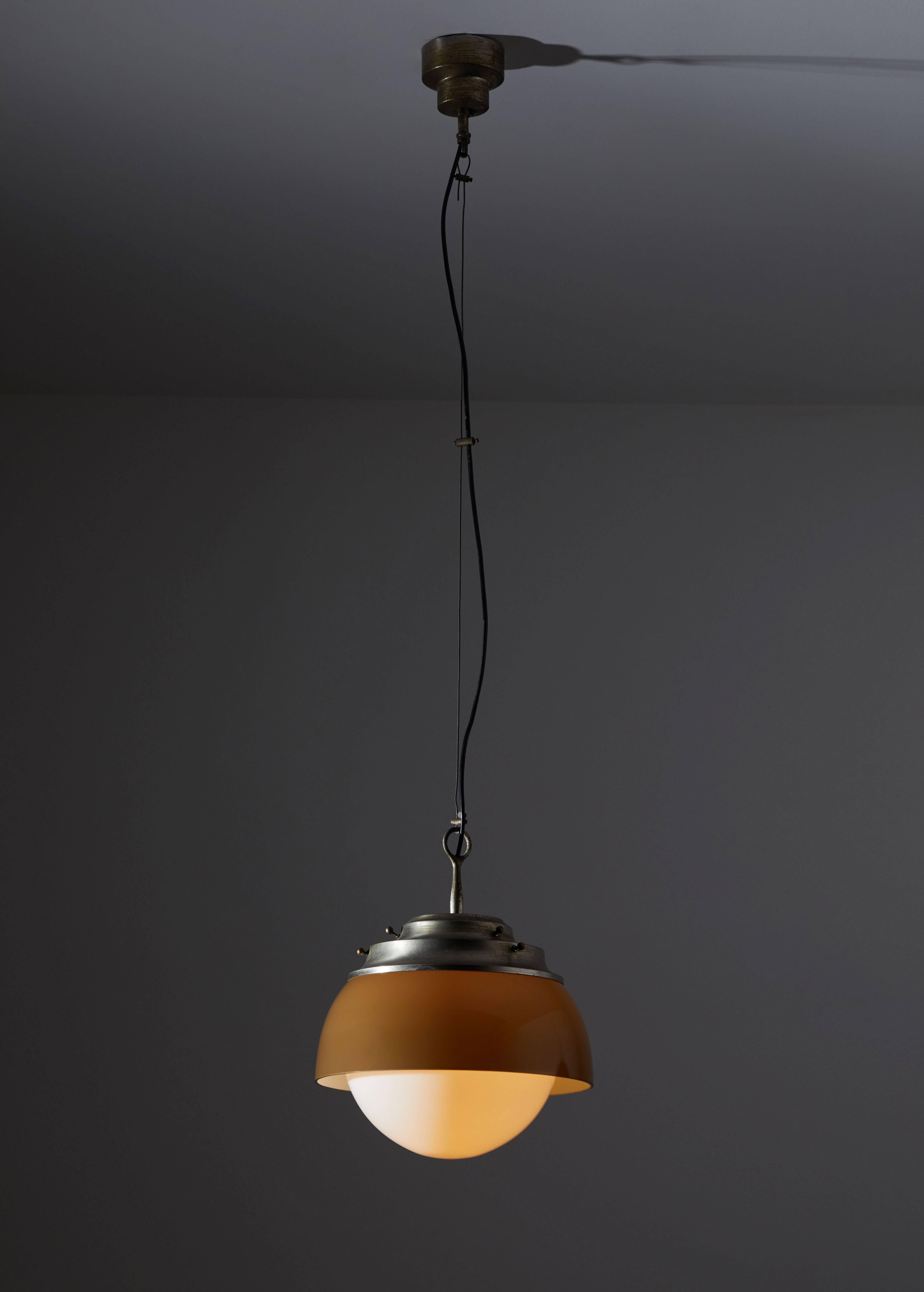 Single Pendant by Artemide. Designed and manufactured in Italy, circa 1960s. Glass diffuser and shade with nickel-plated brass hardware. Wired for US junction boxes. Pendant takes one E27 100w maximum bulb. Overall drop can be adjusted.