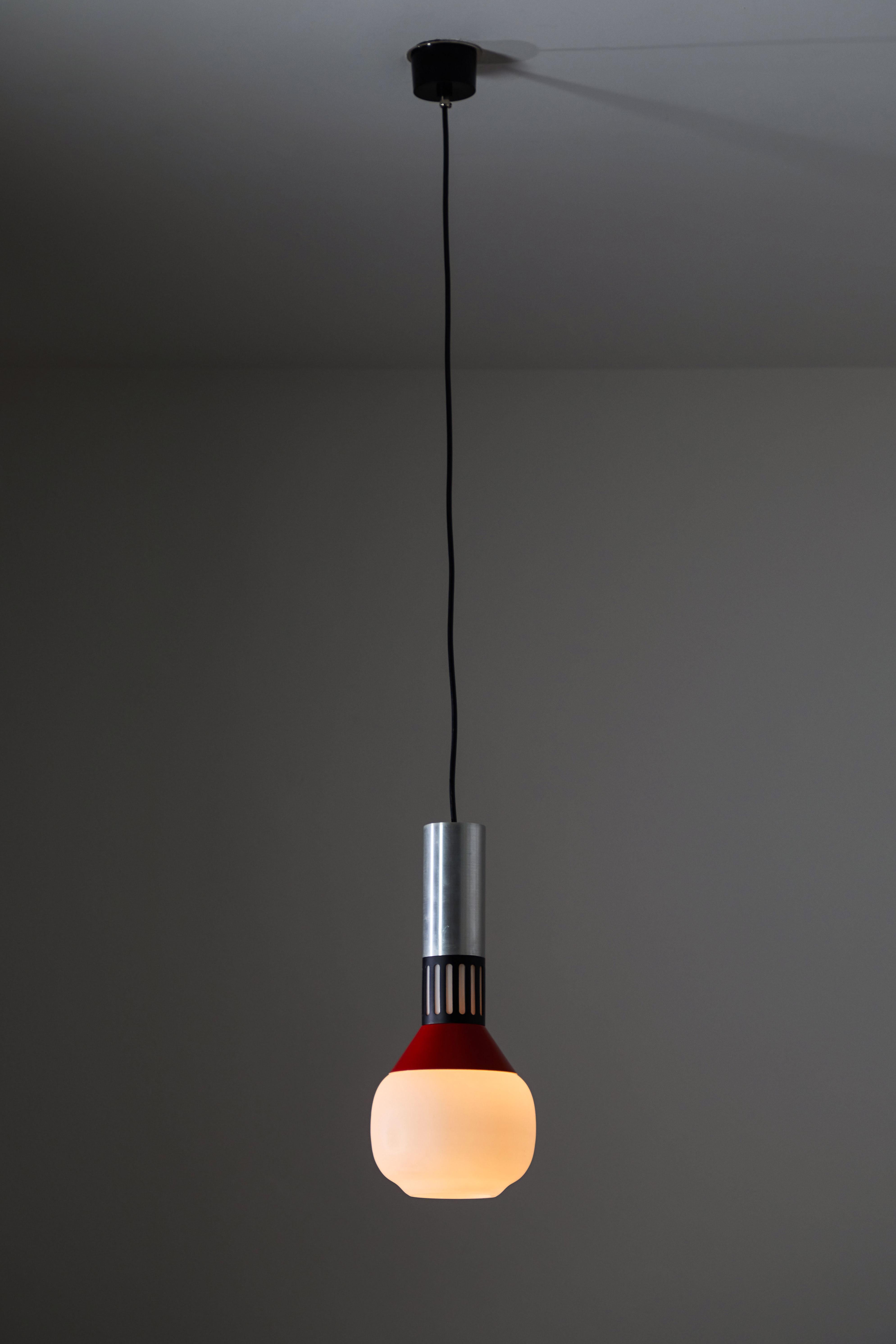 Single pendant by Stilnovo. Manufactured by Stilnovo in Italy, circa 1950s. Lacquered aluminum, acrylic and brushed satin glass diffuser. Rewired for US junction boxes. Takes one E27 75w maximum bulb. Retains original manufacturer's label. Height